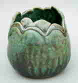 pinch pot with design at rim, 6" high, 
